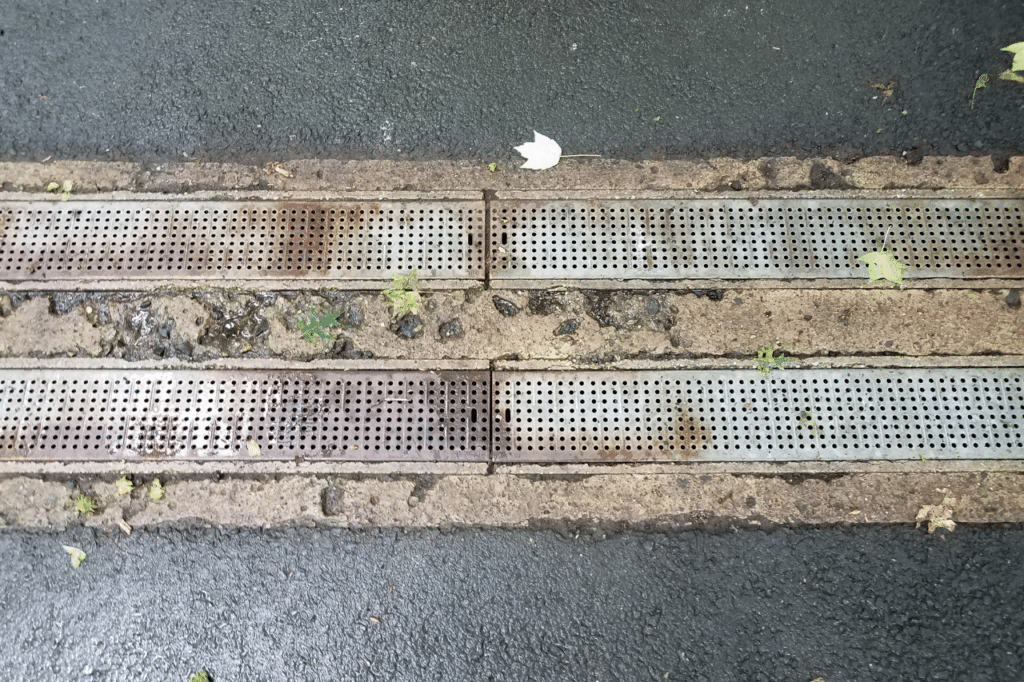 pulizia tombini stradali